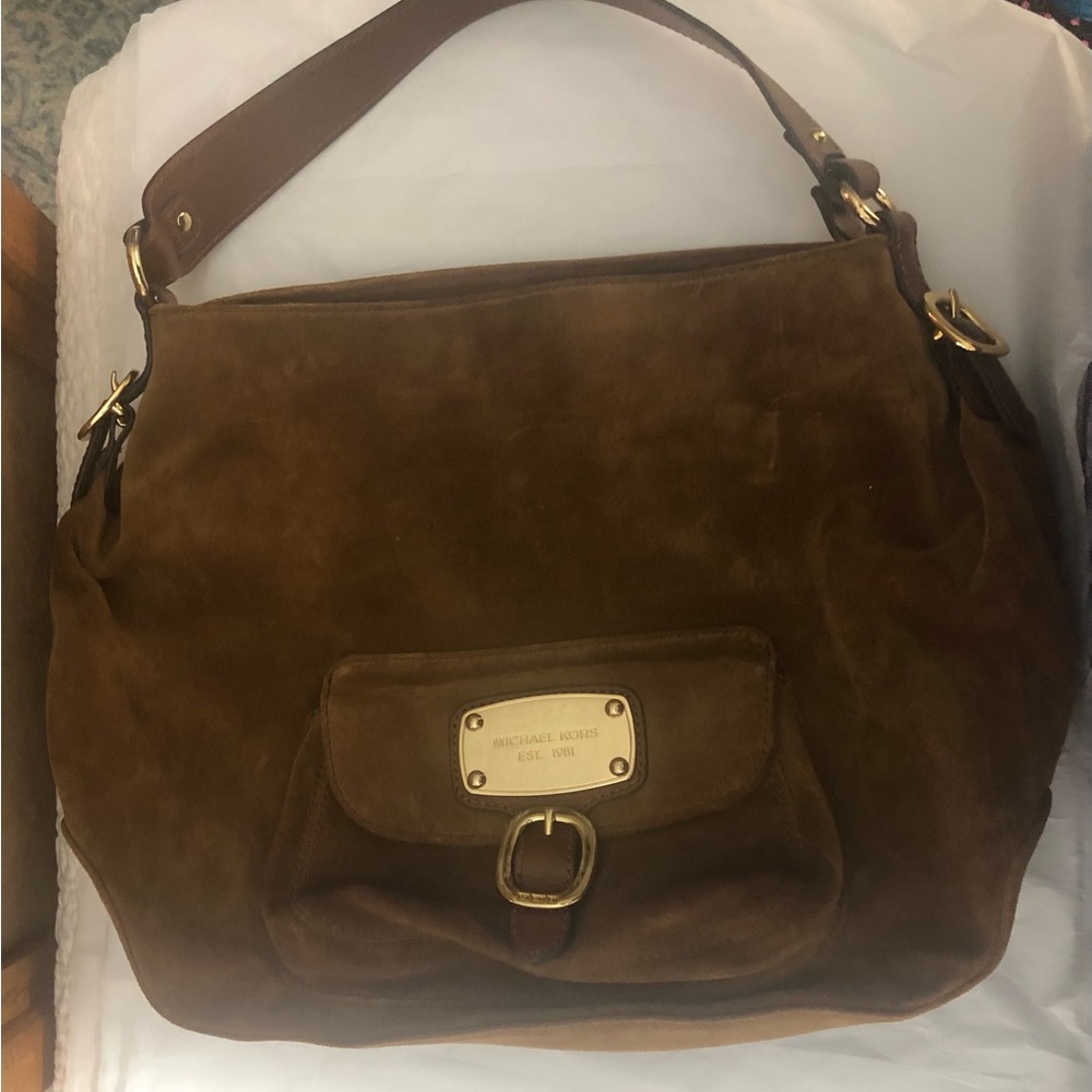 Genuine suede leather.  Michael Kors